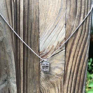 Silver plated 18” pearl cage and fresh water pearl